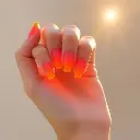 An ethereal illustration of a hand with sunset ombre gel nails transitioning from orange to pink, glowing under golden hour sunlight, using natural earth tones, browns, beiges, and muted colors, emitting a light au.webp