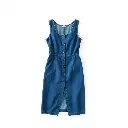 Vibrant, contrasting colors define this precise architectural color photograph. A sleeveless medium-wash blue denim mini dress with scoop neckline and front slit, displayed flat on a white background, features shar.webp